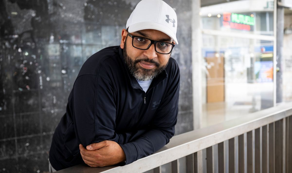 Mourad El Mouden poses for pictures in Saint-Denis