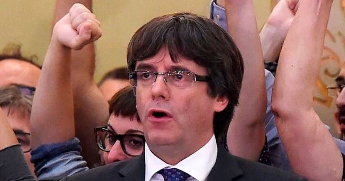 Exiled Catalan leader sneaks back into Spain as police search sewers | World | News