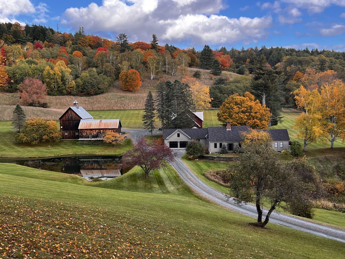 Trees and houses against sky during autumn,Pomfret,Vermont,United States,USA